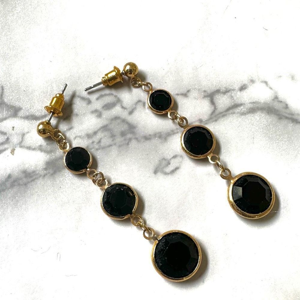 Gold tone and black long circle drop earrings